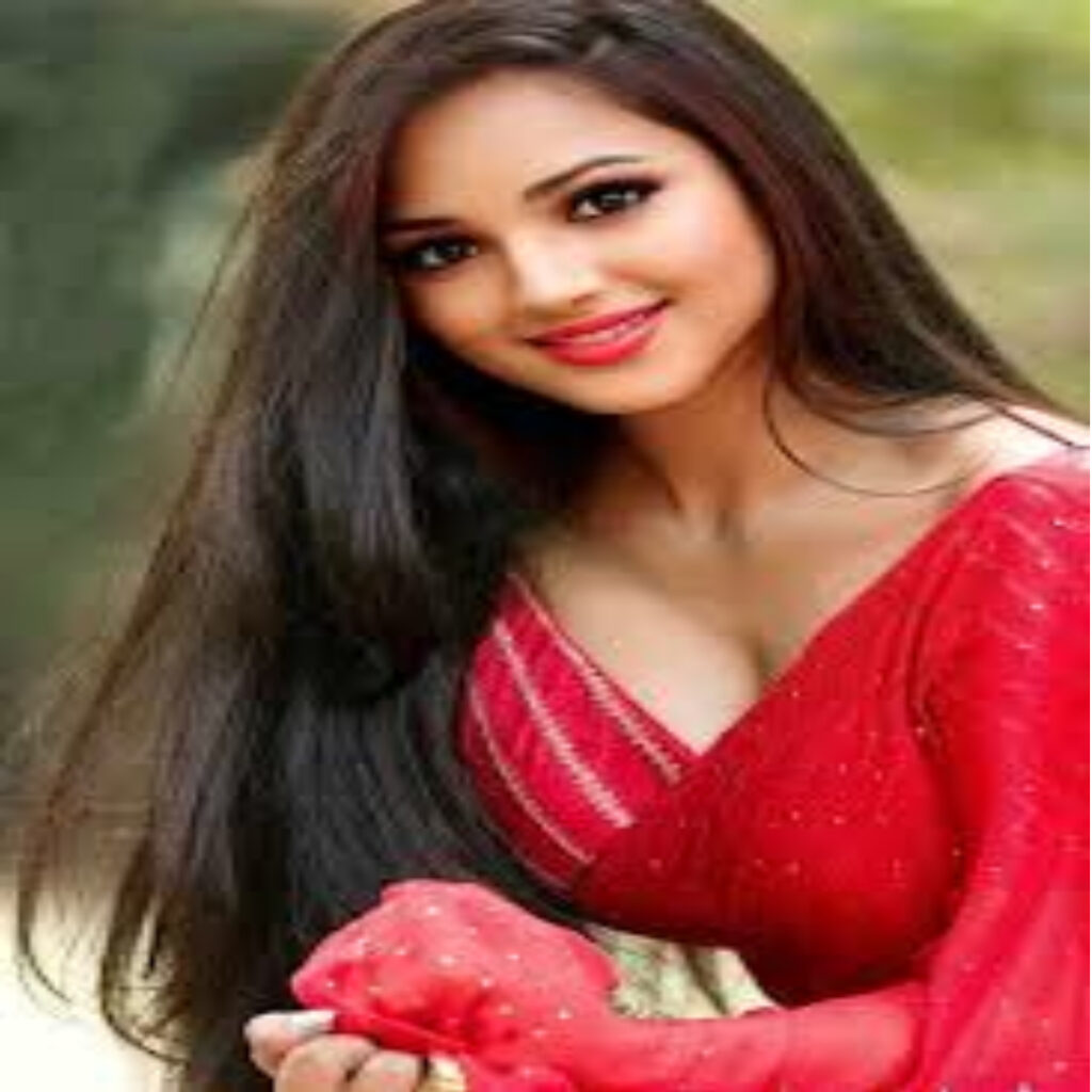 A GIRL IN RED DRESS HAVING LONG HAIR SHOWING HER FACE